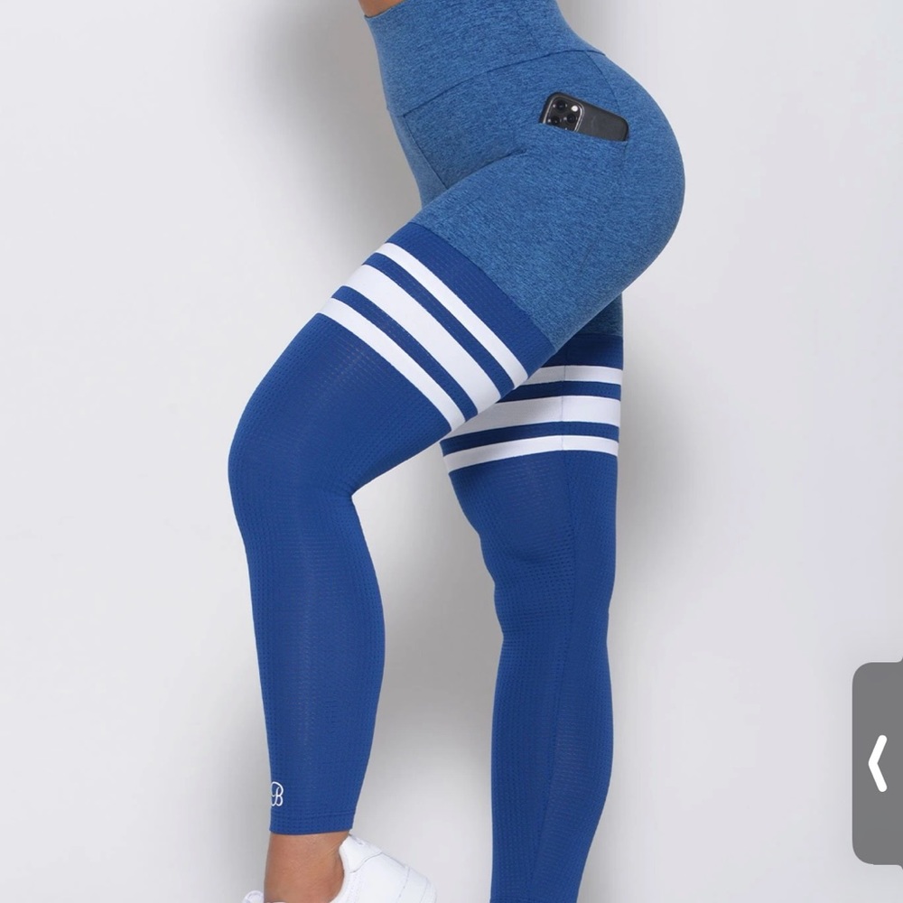 bombshell pocket thigh high leggings in the color ocean. gently worn